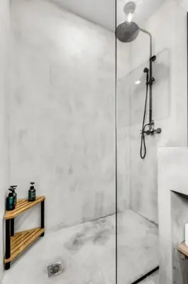 a shower with a glass door in a bathroom at 4BR Biscayne River Home- Pool & Pickleball Fun home in Miami