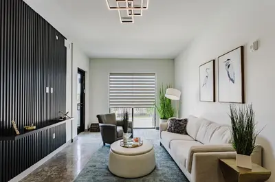 a living room with a couch and a table at Lux Design Apartment near beach in Fort Lauderdale