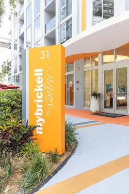 an orange sign in front of a building at Spacious and bright in the heart of Brickell in Miami