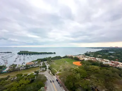 an aerial view of a city and the water at Miami top stay is nearly sold in Miami