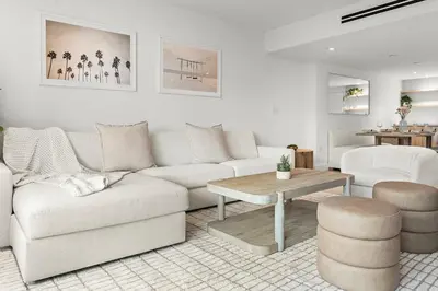 a living room with a couch and a table at 2 Bedroom Private Residence at Roney Palace -630 in Miami Beach