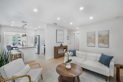 a living room with a couch and a table at Chic Villa Nina 2 bedrooms 2 baths in Miami! in North Miami
