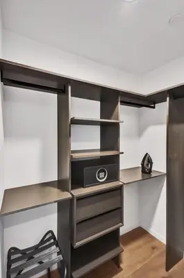a closet with a desk and a chair at Lux Miami Studio City Bay Views in Miami