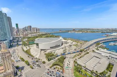 an aerial view of a city with a large building at Lux Miami Studio City Bay Views in Miami