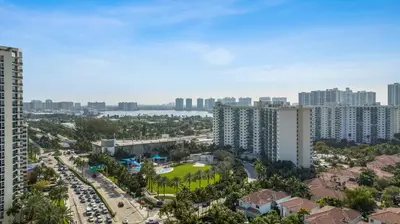 an aerial view of a city with tall buildings at Entire Condominium in Sunny Isles in Sunny Isles Beach