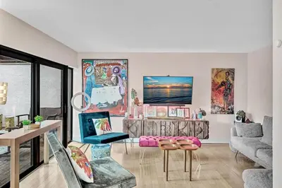 a living room with a couch and a table at Coconut Grove Haven Family in Miami