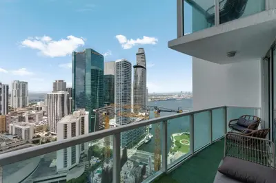 a balcony with a view of a city at Brickell River Views- modern amenities in the city in Miami