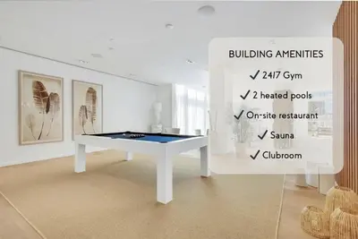 a white room with a ping pong table in it at Tiffany Shoreline - PH Floor, Ocean View, Walk to beach in Fort Lauderdale