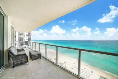 a balcony with a view of the ocean at Balcony on the Ocean - Picture Perfect in Sunny Isles Beach