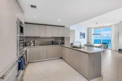 a kitchen with a sink and a counter top at Luxury Penthouse 4 BDR with Resort Amenities in Hollywood