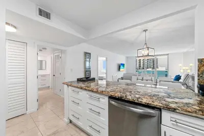 a kitchen with a sink and a counter top at Oasis on the Beach - For 4 in Miami Beach