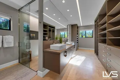 a large bathroom with a sink and a shower at Villa Marea - Heated Pool Spa & Water Views in Fort Lauderdale