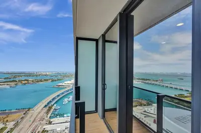 a view of the ocean from the balcony of a building at 2304 Luxury Miami Studio Stunning Bay View in Miami