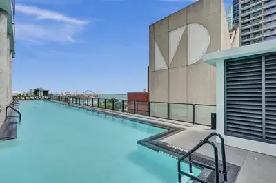 a swimming pool on the side of a building at Miami Lux 1BR 37th Floor Bay City Views in Miami