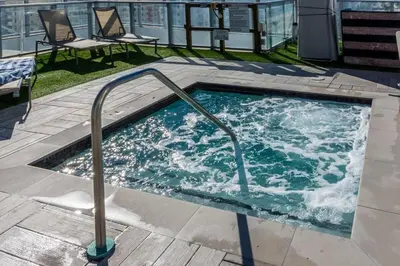 a hot tub with a hand rail in a building at Relaxing Beach Escape with Scenic Views in Hollywood