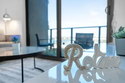 a sign that says oak sitting on a table in a living room at 2 Bed Best Views in Downtown and Brickell in Miami