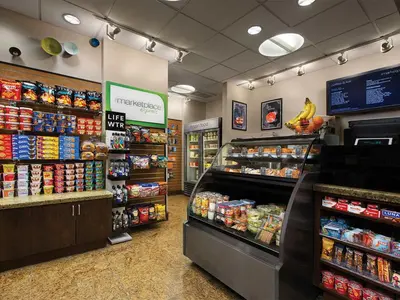 a grocery store aisle with food and drinks on display at Marriott's BeachPlace Towers Studio Apartment with Resort Access in Fort Lauderdale