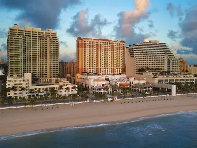a view of a beach with hotels and buildings at Marriott's BeachPlace Towers 1BR Apartment with Resort Access in Fort Lauderdale