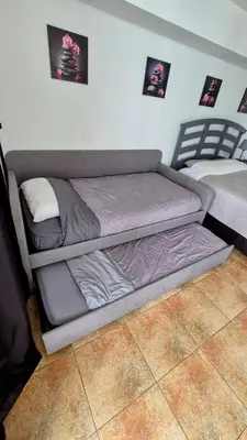 a bed in a room with two beds at 36th Floor Brickell Suite with City Skyline and Bay Views in Miami
