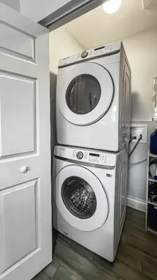 a washer and dryer in a room with a door at Hope Casa Heated Pool and BBQ 4bedrooms 2baths by HostyMosty in Hollywood