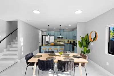 a kitchen and dining room with a table and chairs at Family-Friendly Apt in Miami - Sleeps 4, Near Everything in Miami
