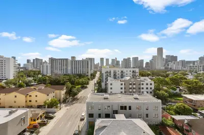 an aerial view of a city with tall buildings at Luxury Pent House with Downtown Views in Miami