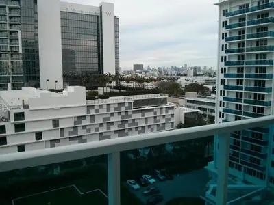 a view of the city from the balcony of a building at 2 bedroom at The Roney Palace Condominiums Apt 1006 in Miami Beach