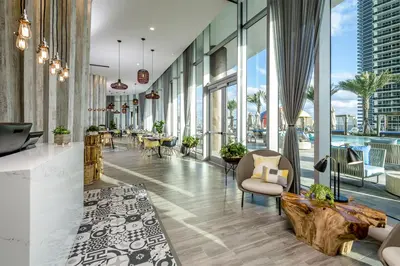 a lobby with a view of the city at Charming Condo for Your Dream Vacation in Hollywood