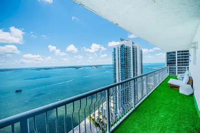 a balcony with a view of the ocean at Top Floor Front Facing Penthouse With Breathtaking Views in Miami