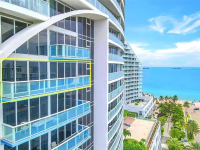 an apartment building with a view of the ocean at Exclusive Beachfront Condo at W Fort Lauderdale in Fort Lauderdale