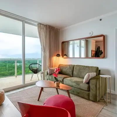 Elegant 2BR Condo at Hotel Arya Full Kitchen Wraparound Views 2 Parking Spots