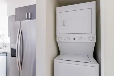 a kitchen with a refrigerator and a microwave at Blueground Riverside pool nr Miami River MIA-155 in Miami