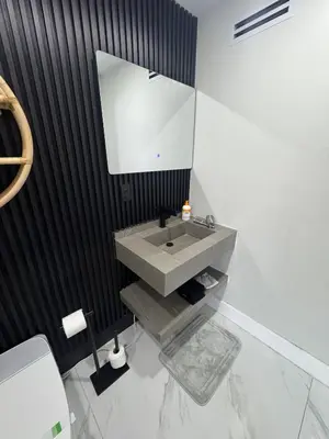 a bathroom with a sink and a mirror at 12 Guest-In The Center of It All in Miami
