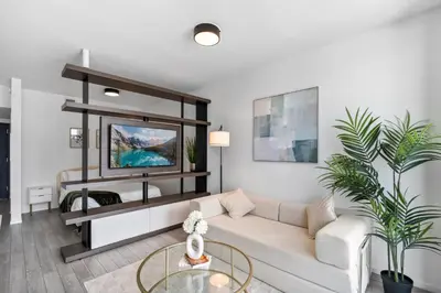 a living room with a couch and a table at High-Rise Luxury Condo in Downtown Miami with Ocean Views in Miami