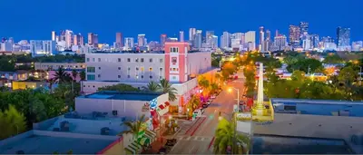 a view of a city skyline at night at The Purple Paradise PoolHot Tub Little Havana in Miami