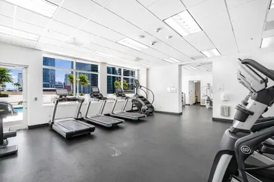 a gym with cardio equipment in a building at Comfortable Brickell Studio - City View & Free Parking in Miami