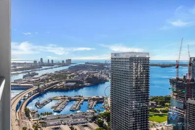 an aerial view of a city and a river at Beautiful Studio with Private Balcony Gym & Pool in Miami