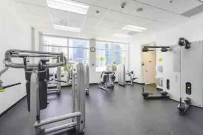 a large room with a gym with tread machines at Brickell 3802 · Picturesque Bay Views Pool Sleeps 8 Gym in Miami
