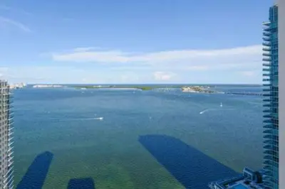a view of a large body of water from a building at Brickell 3802 · Picturesque Bay Views Pool Sleeps 8 Gym in Miami