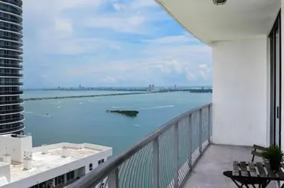 a balcony with a view of a large body of water at Waterfront 1BR w Bay ViewsBalcony Full Kitchen in Miami