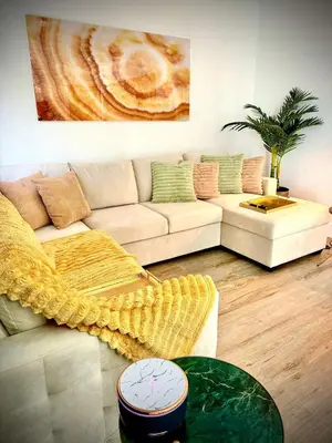 a living room with a couch and a table at Miami Vibes in Miami