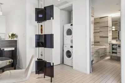 a laundry room with a washer and dryer at Oceanview Private Home at South Beach-814 1B in Miami Beach