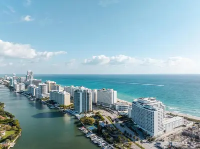 an aerial view of a city next to the ocean at Shine Suites Balcony Studio 7 in Miami Beach