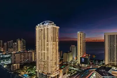 a city skyline at night with tall buildings at Luxury Corner Apartment in Hollywood Beach in Hollywood