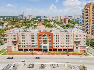 an aerial view of a large building in a city at Lovely 2 bedrooms 2 bathrooms Apt, Sleeps 4, Split King bed, Free Parking, Pet OK in Miami