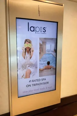a framed picture of a woman looking through a pair of sunglasses at FontaineBleau Suite Ocean View in Miami Beach
