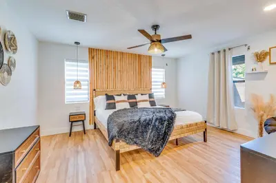 a bedroom with a bed and a ceiling fan at Fox Garden Luxury Boho Near Downtown & Beach in Fort Lauderdale