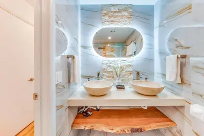 two sinks in a bathroom with a mirror at Fox Garden Luxury Boho Near Downtown & Beach in Fort Lauderdale