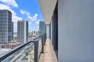 a balcony with a view of a city at Top-floor 3BR Stay with skyline views in Miami