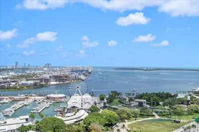 a view of a harbor with boats in the water at Top-floor 3BR Stay with skyline views in Miami